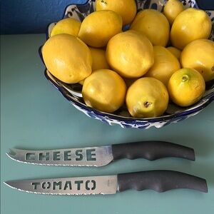 2 Knives 1 For Tomato 1 For Cheese great on a charcuterie board